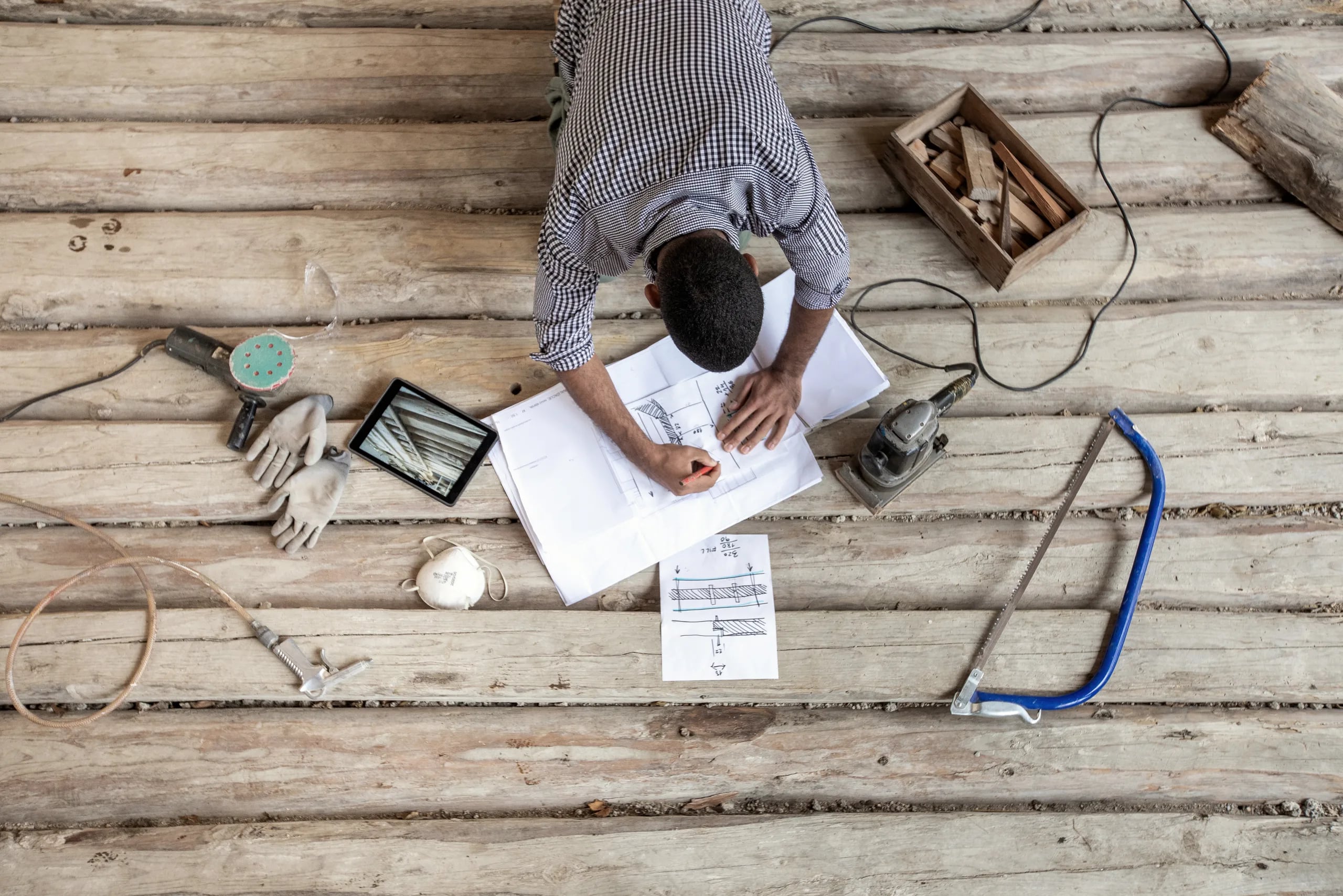Craftsman working on wood and stone floor restoration in Yorkshire