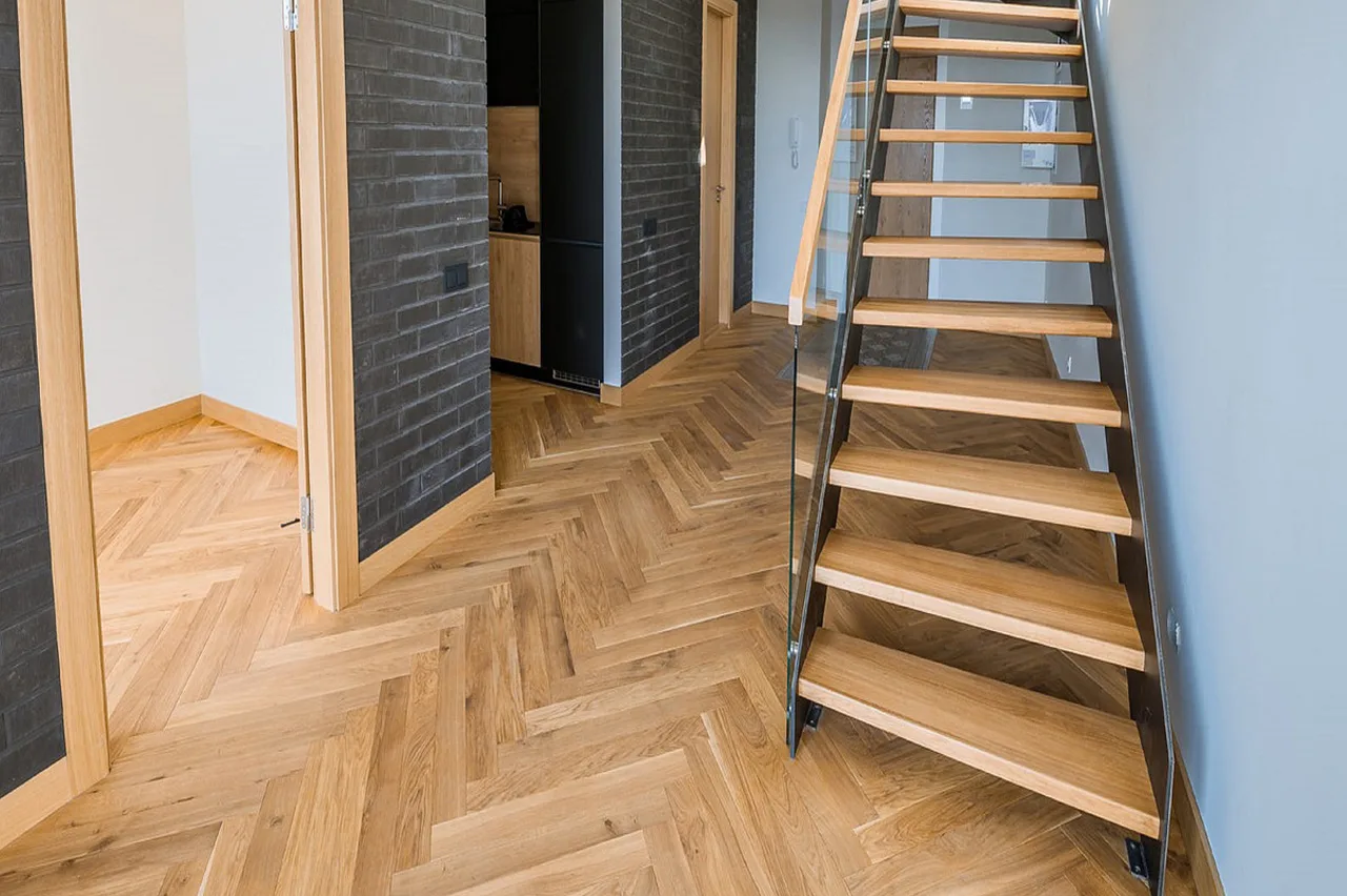 Restored wooden staircase and parquet flooring in a modern Yorkshire home